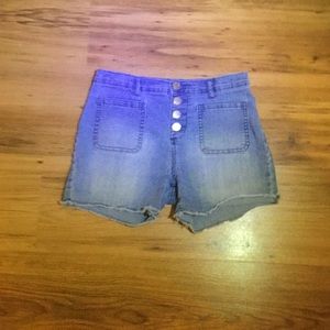 We are selling these denim four button up shorts!
